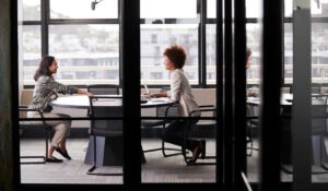 two women in meeting room